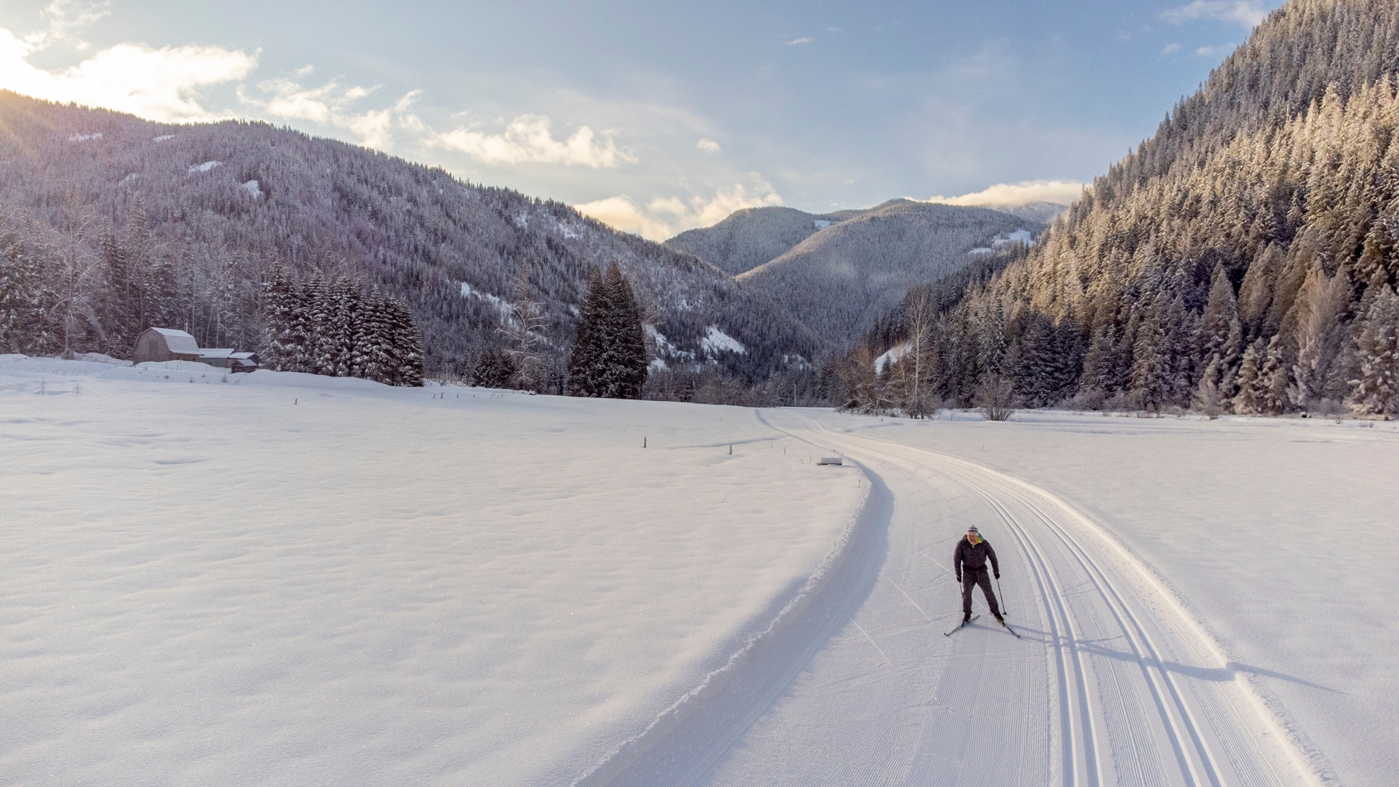 Early morning skier at Nelson Nordic